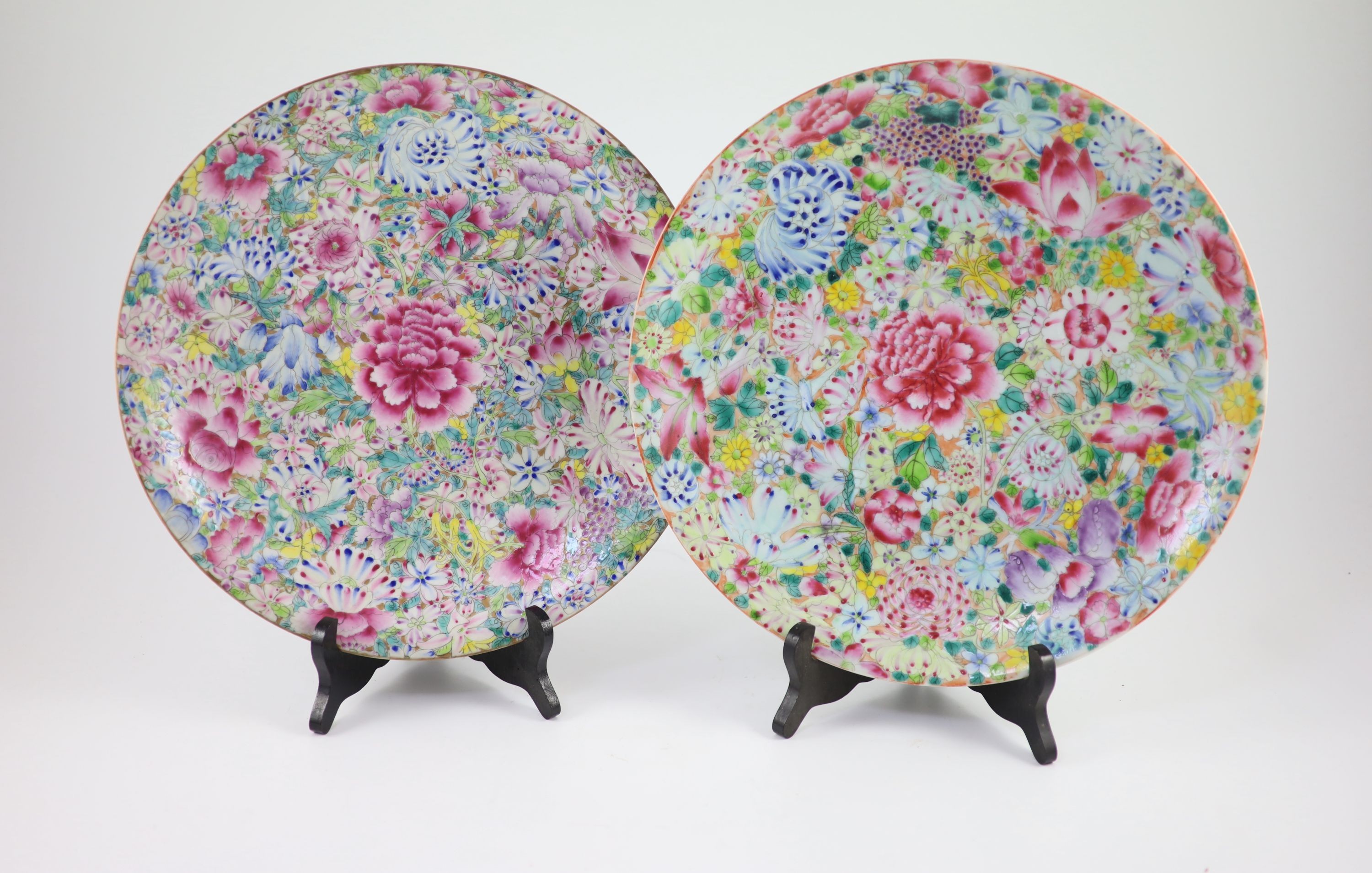 A near pair of Chinese famille rose’millefleur’ dishes and a similar alms bowl, Republic period, Dishes 32.5 and 33.5 cm diameter, bowl 24 cm diameter